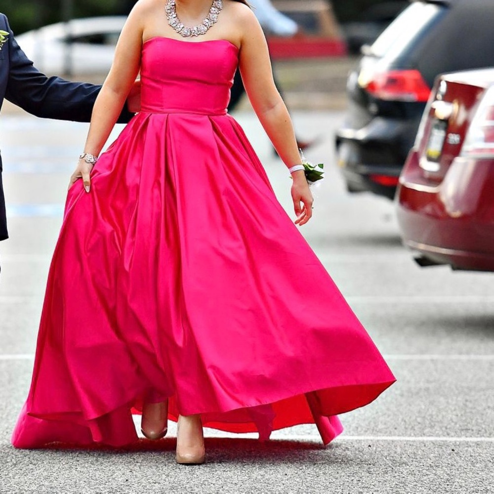 Hot pink strapless prom dress! Brand is Betsy and Adam. Size 8.